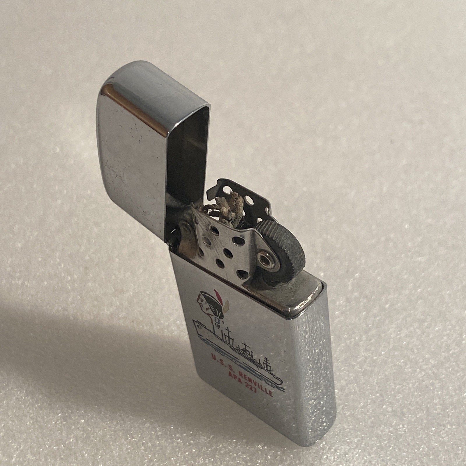VINTAGE ZIPPO SLIM SHIP LIGHTER U.S.S. RENVILLE APA 227