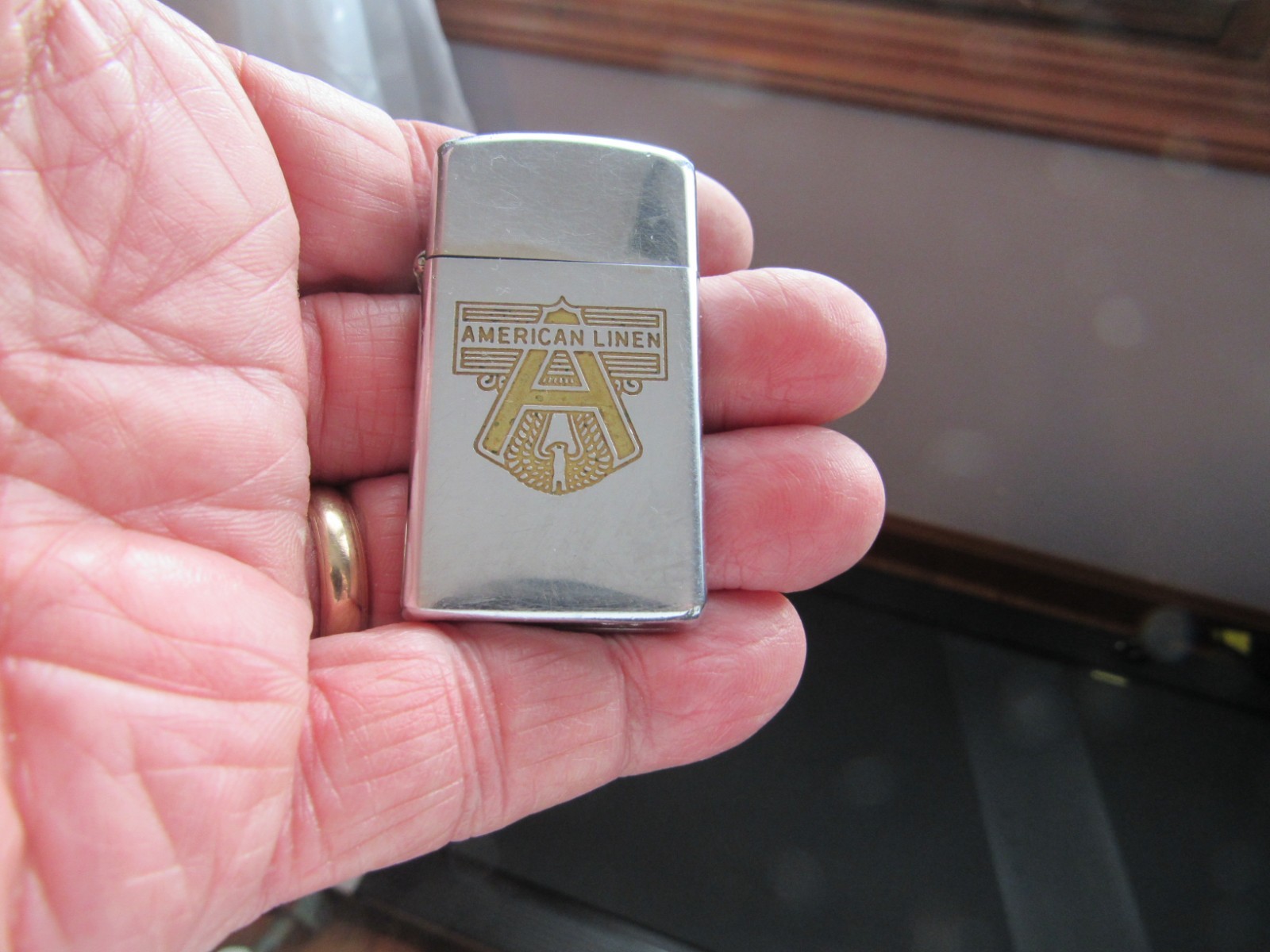 Vintage Pre-Owned Zippo Slim Cigarette Lighter Adv. American Linen 1971