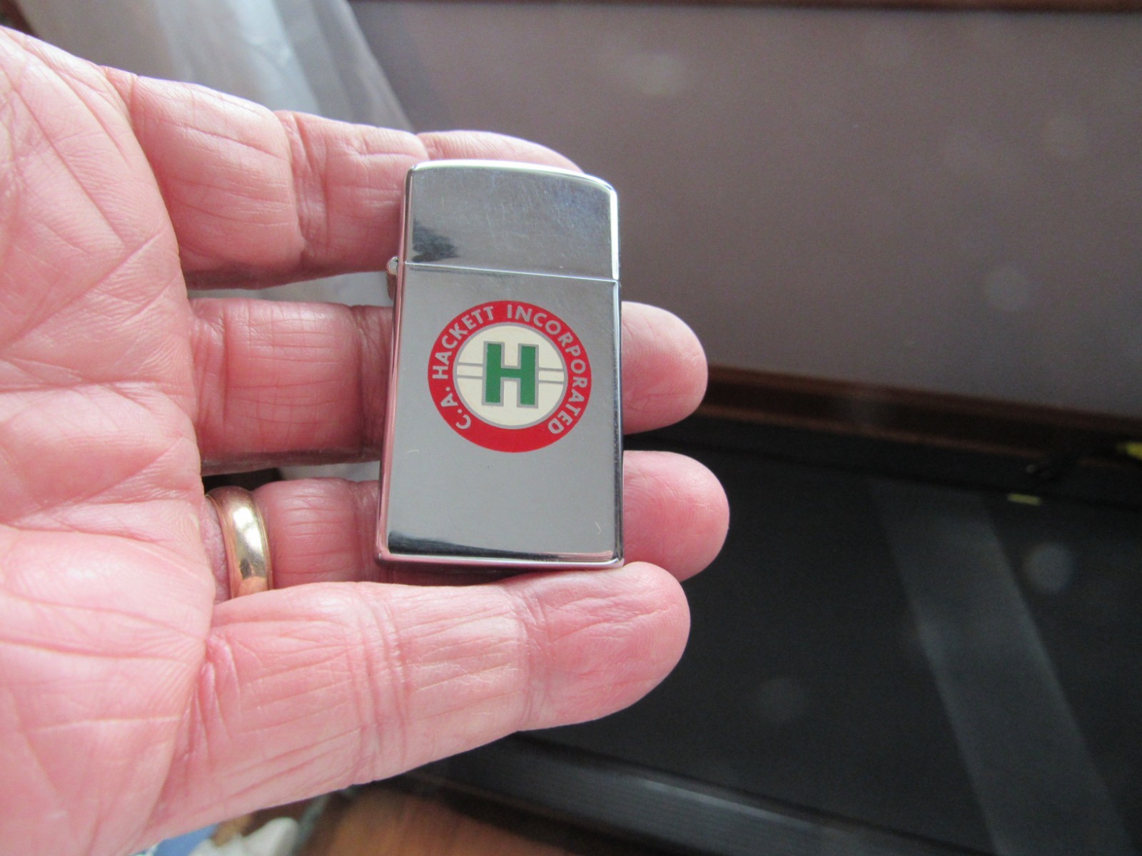 Vintage Pre-Owned Zippo Slim Line Cigarette Lighter Adv. C.A. Hackett Inc. 1964