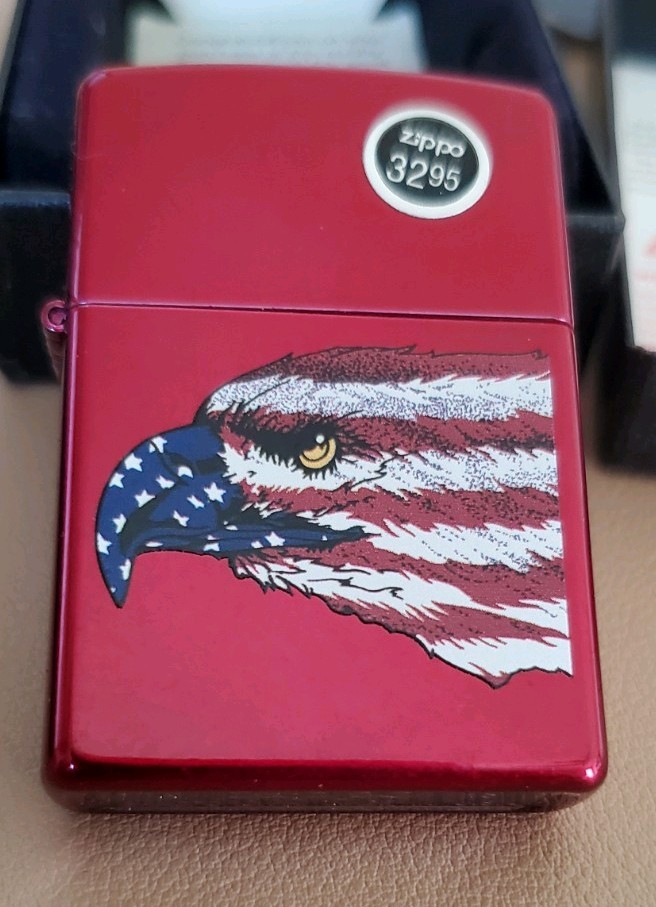 NIB METALLIC RED ZIPPO WITH EAGLE IN AMERICAN FLAG DESIGN WITH 2 PACK NEW WICKS