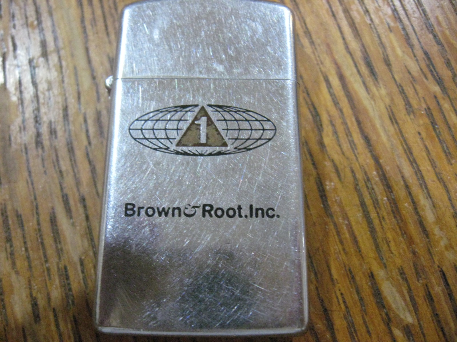 Vintage Zippo Brown & Root, Inc. Lighter w/#1 in Logo