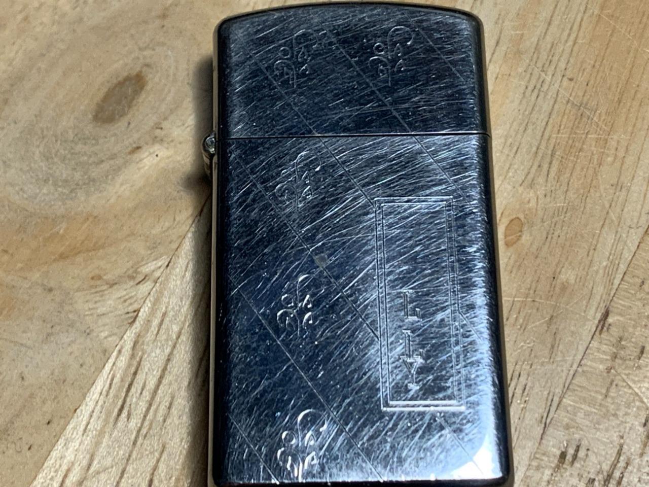 Vintage 1975 Zippo Slim Chrome Etched Lighter L.L.Y. Initials 1 1/4″ x 2 1/4″