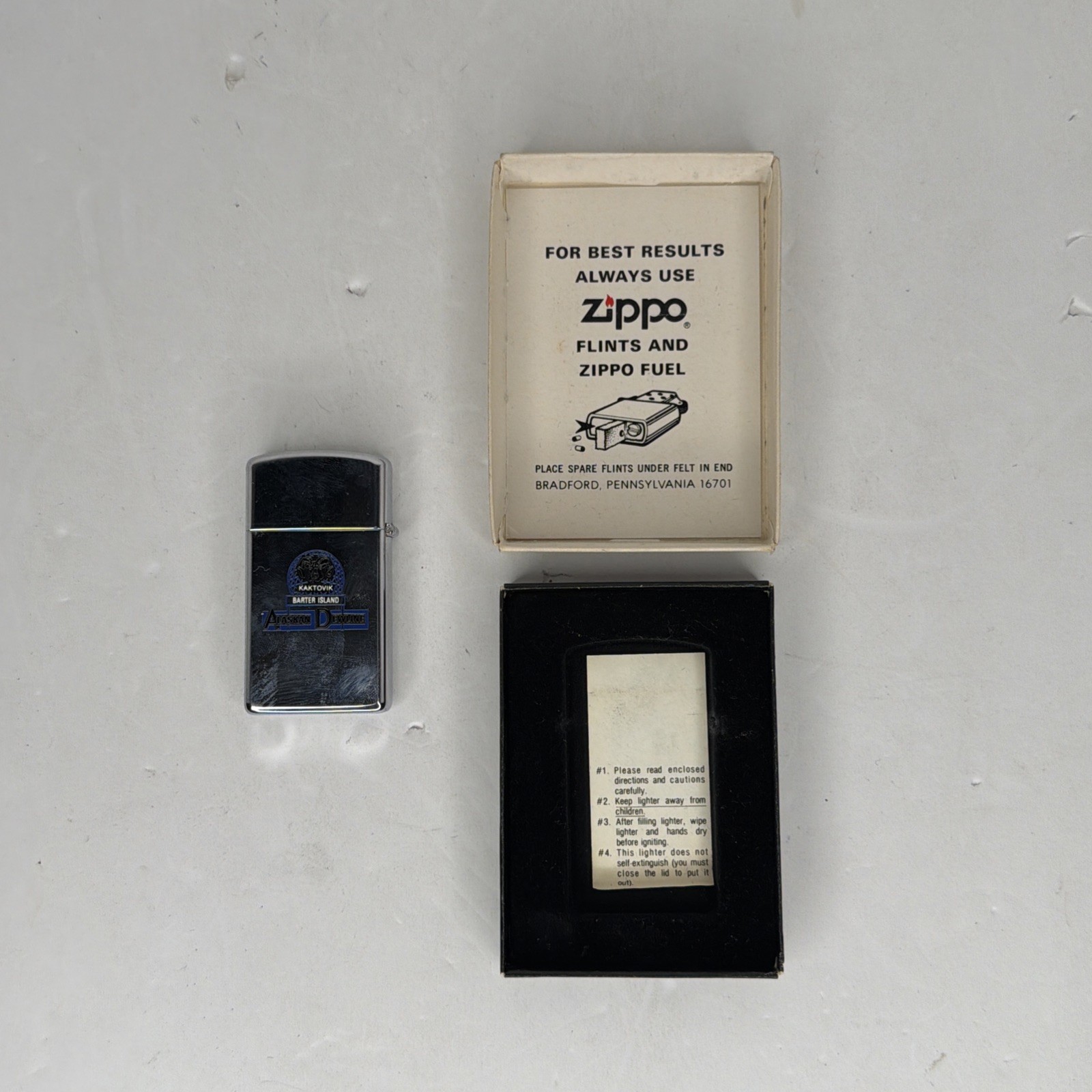 Vintage Zippo Slim Lighter Alaskan Dewline Made in USA Advertising Collectible