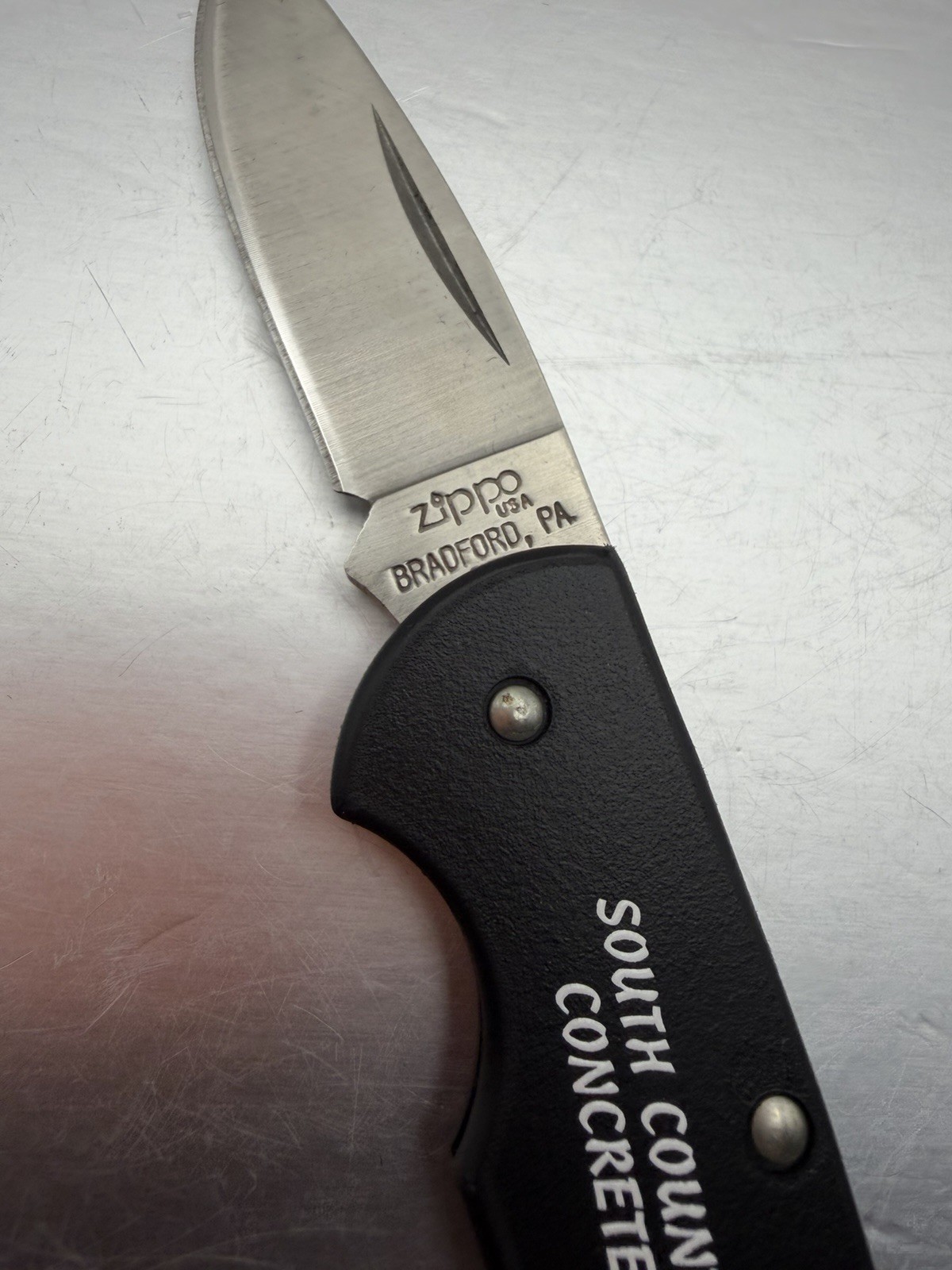 Vintage South County Concrete Advertising Stainless Zippo Pocket Knife NEW B52