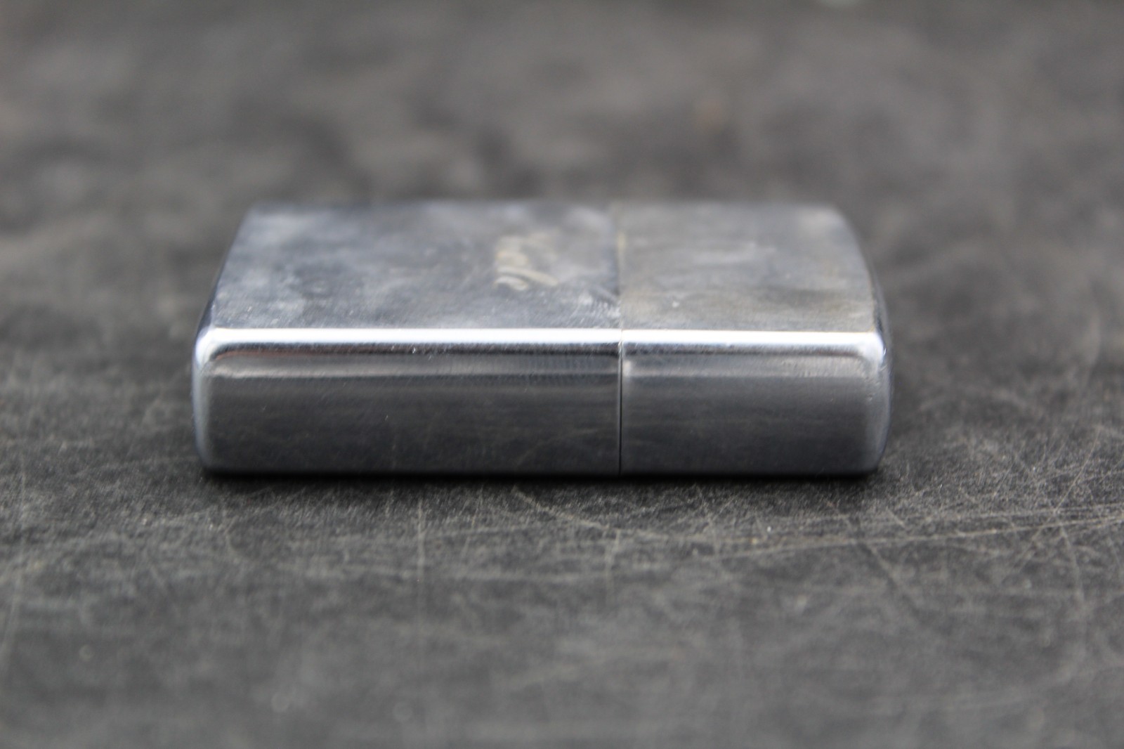 Zippo Lighter 2-1/4” X 1-1/8”.
