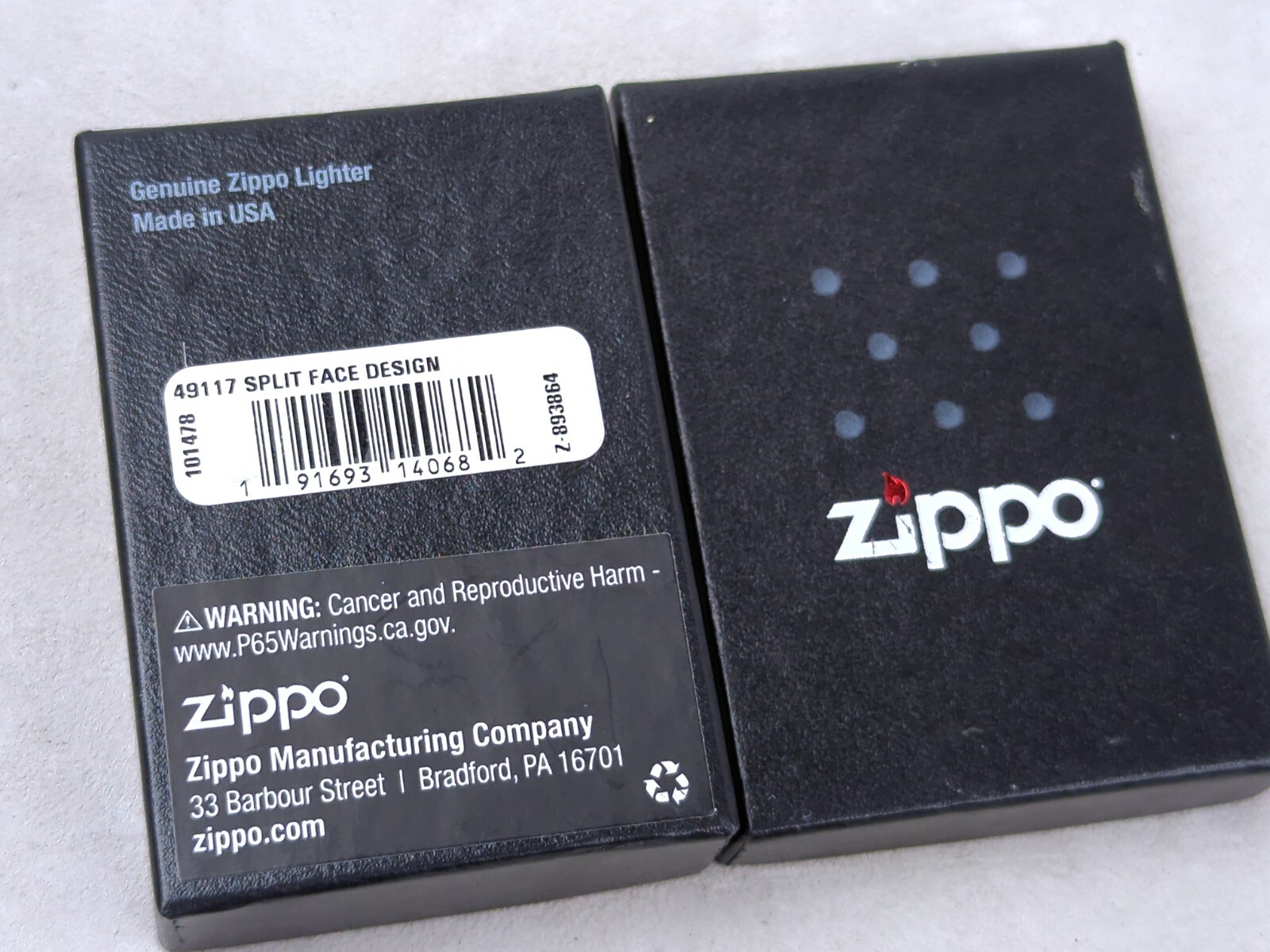 Zippo 49117 SPLIT FACE DESIGN on High Polish Black Windproof Lighter MARCH 2019