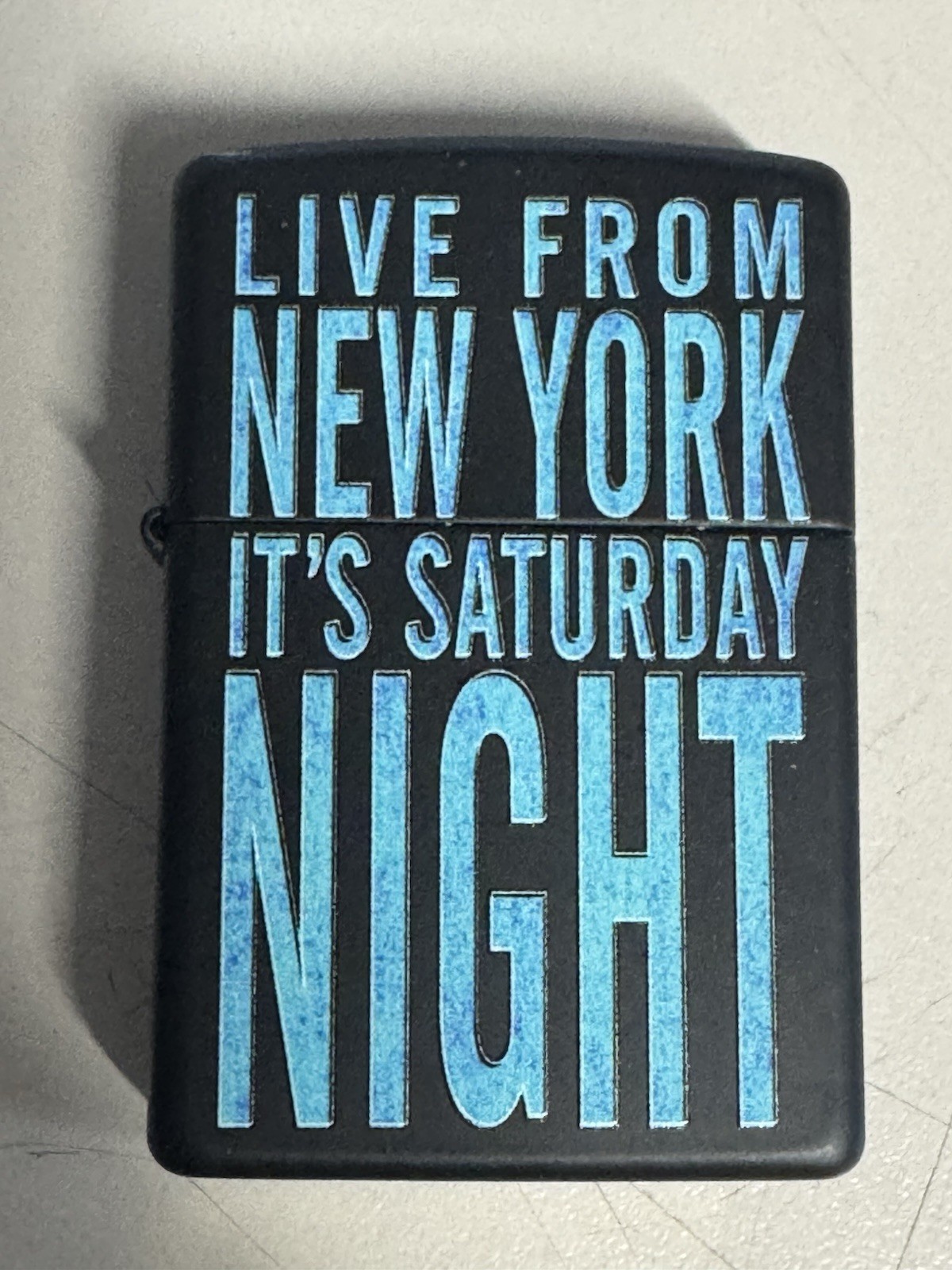 ZIPPO 2012 LIVE FROM NEW YORK ITS SATURDAY NIGHT MATTE LIGHTER SEALED IN BOX D61
