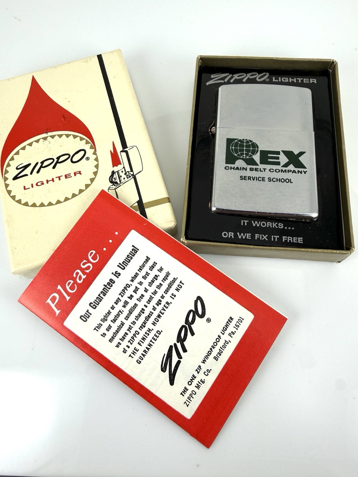 Vintage 1960’s-70’s Zippo Lighter with Rex Chain Belt Co. Logo New In Box