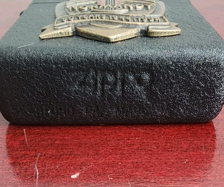 D-DAY NORMANDY 50 YEARS 1944-1994 50 YEARS ZIPPO LIGHTER. W/TIN CASE. SPARKS