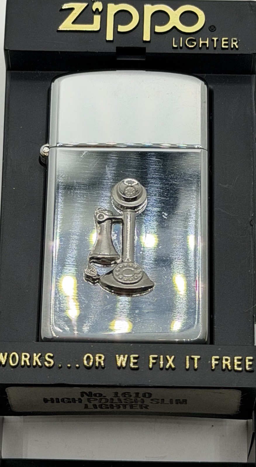 Zippo High Polish Slim lighter, Model #1610, Silver Telephone Emblem