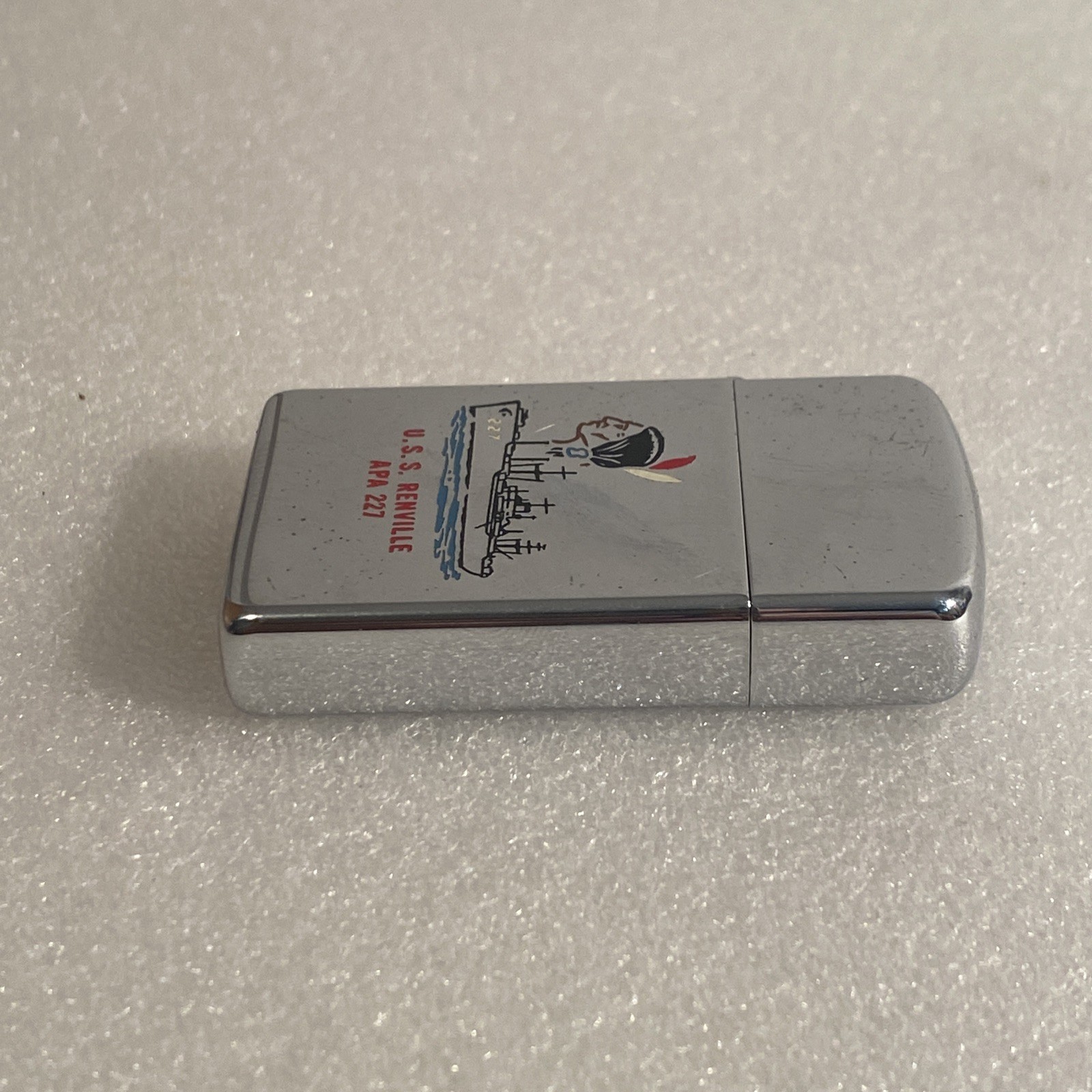 VINTAGE ZIPPO SLIM SHIP LIGHTER U.S.S. RENVILLE APA 227