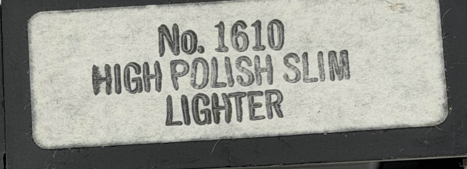 Zippo High Polish Slim lighter, Model #1610, Silver Telephone Emblem