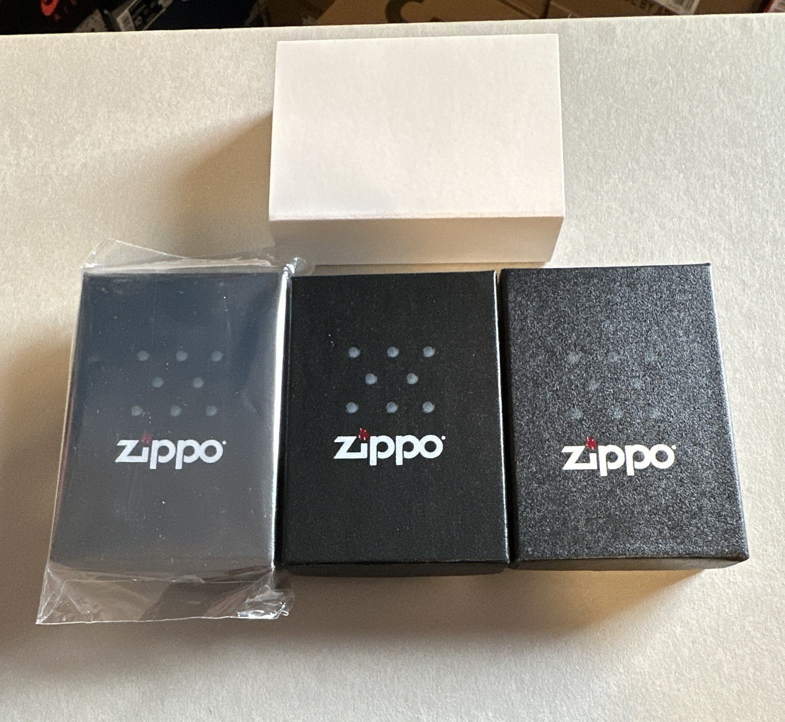 Zippo Lot of 3 Lighters in Boxes: Supreme Red Logo, Swarovski Red, Glow-in-Dark