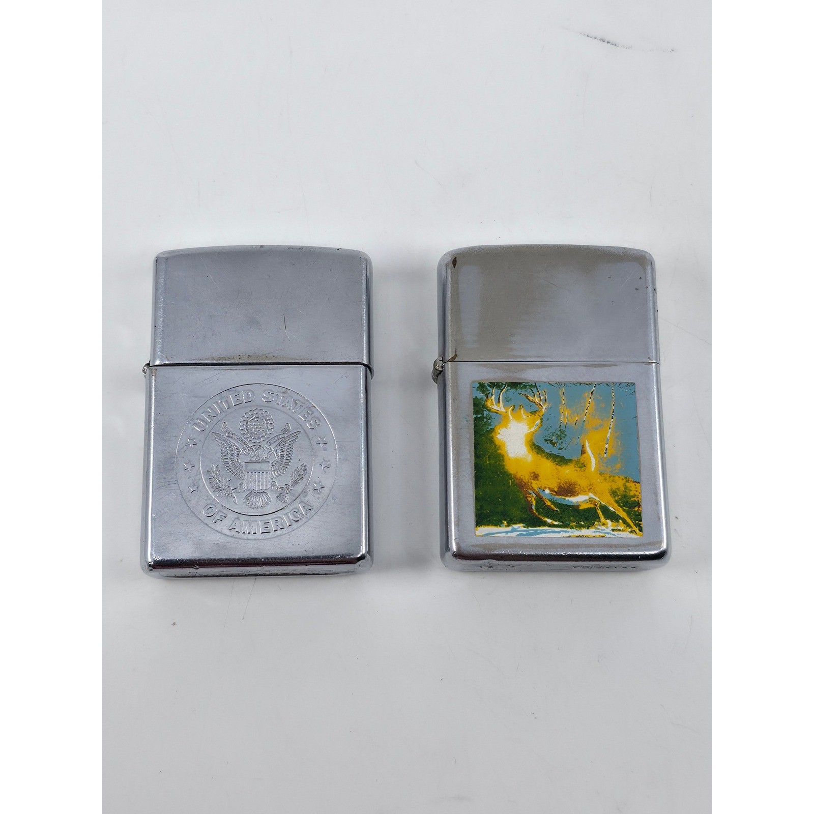 Vintage Zippo Lighter Lot 2pc USA Great Seal 1999 & Buck Deer Graphic Chrome