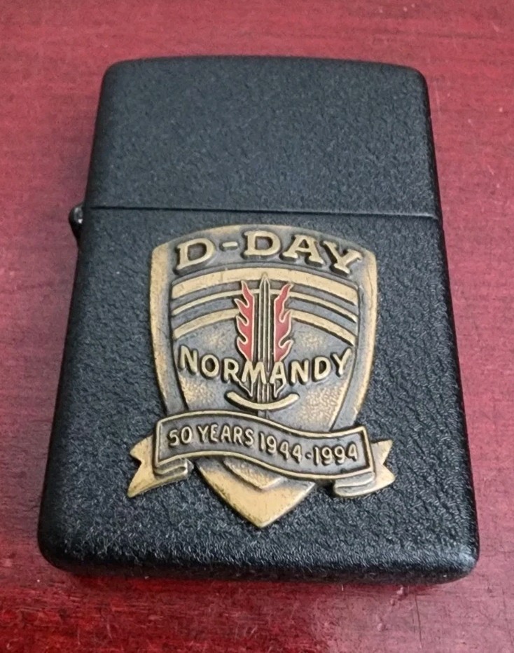 D-DAY NORMANDY 50 YEARS 1944-1994 50 YEARS ZIPPO LIGHTER. W/TIN CASE. SPARKS