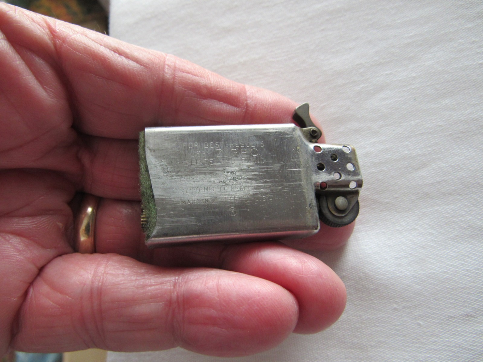 Vintage Zippo Slim Line Cigarette Lighter High Polish Adv. Olan Mills 1976