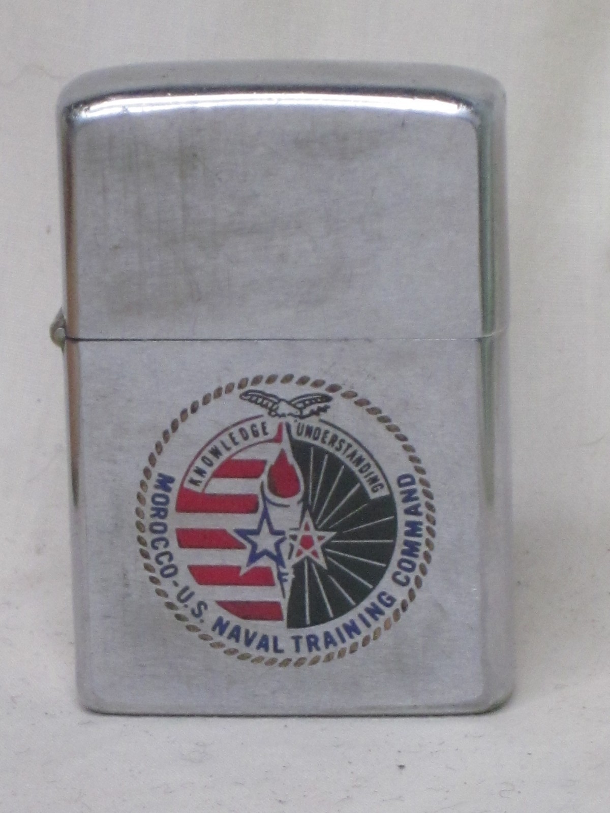 vintage ZIPPO lighter MOROCCO U.S NAVAL TRAINING COMMAND KNOWLEDGE UNDERSTANDING