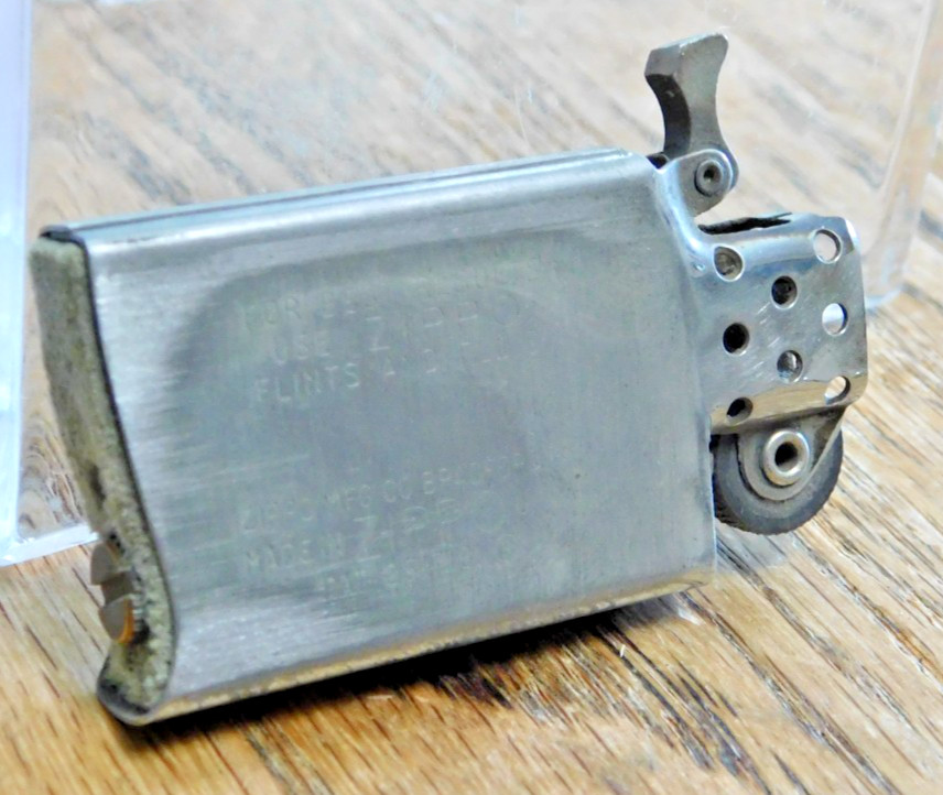 1965 Slim Zippo Cigarette Lighter, with Sales Box. Nice. BUY IT NOW.