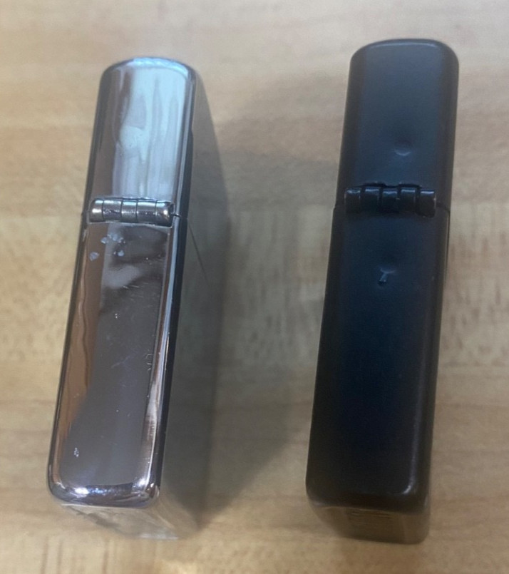 2 Vintage Lighters 1 ZIPPO Made In U.S.A., And 1 A.A.D.L.P. Made In CHINA TESTED