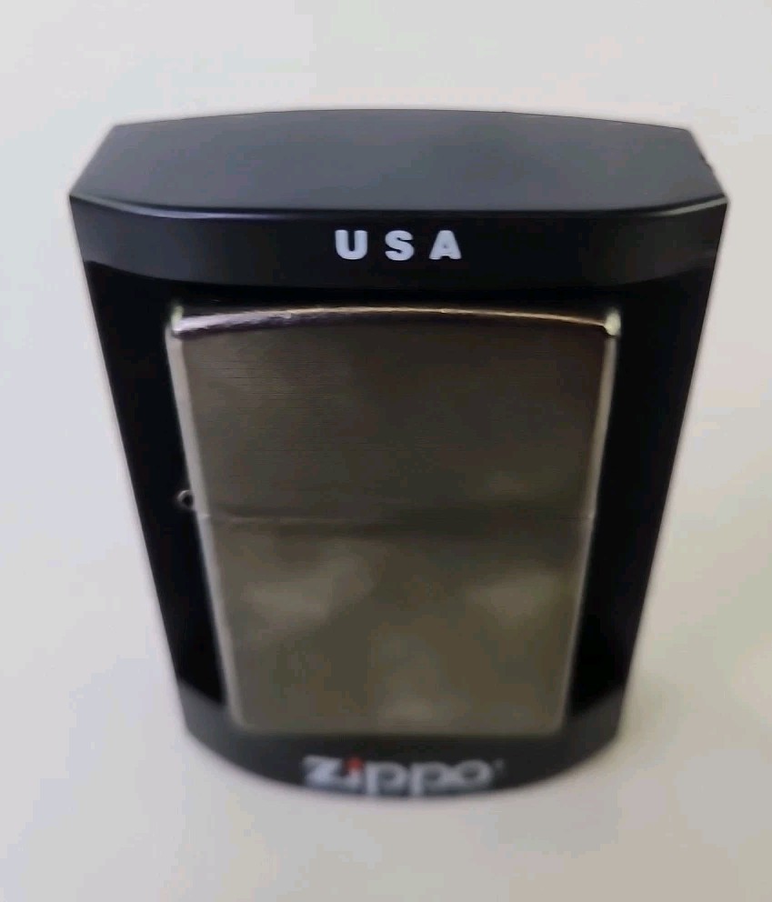 New Old Stock Zippo Lighter, Never opened In original plastic Zippo box 2006