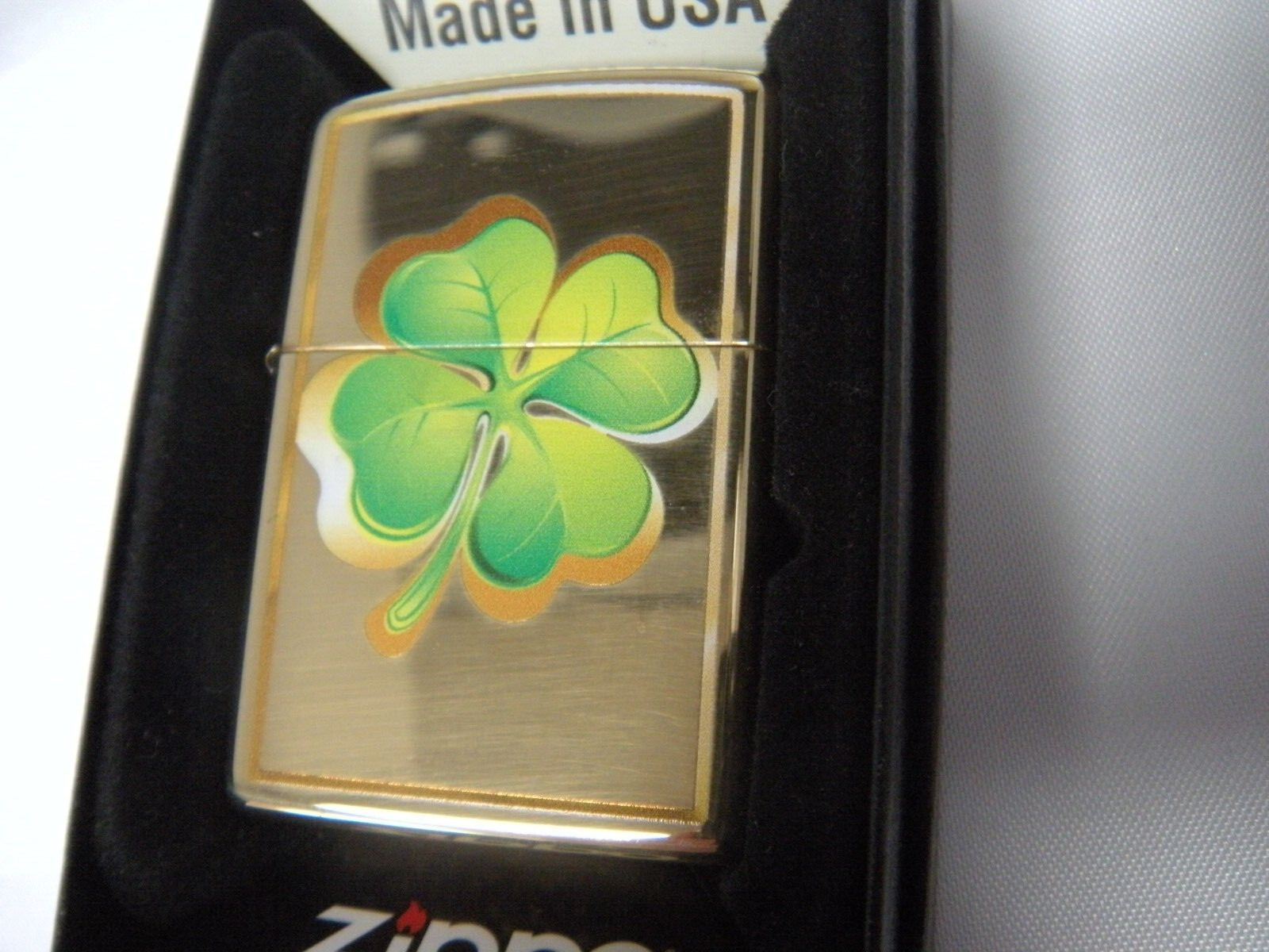 Zippo 4 Leaf Clover Shamock Lighter New in Box Unfired Gold Colored Made In USA