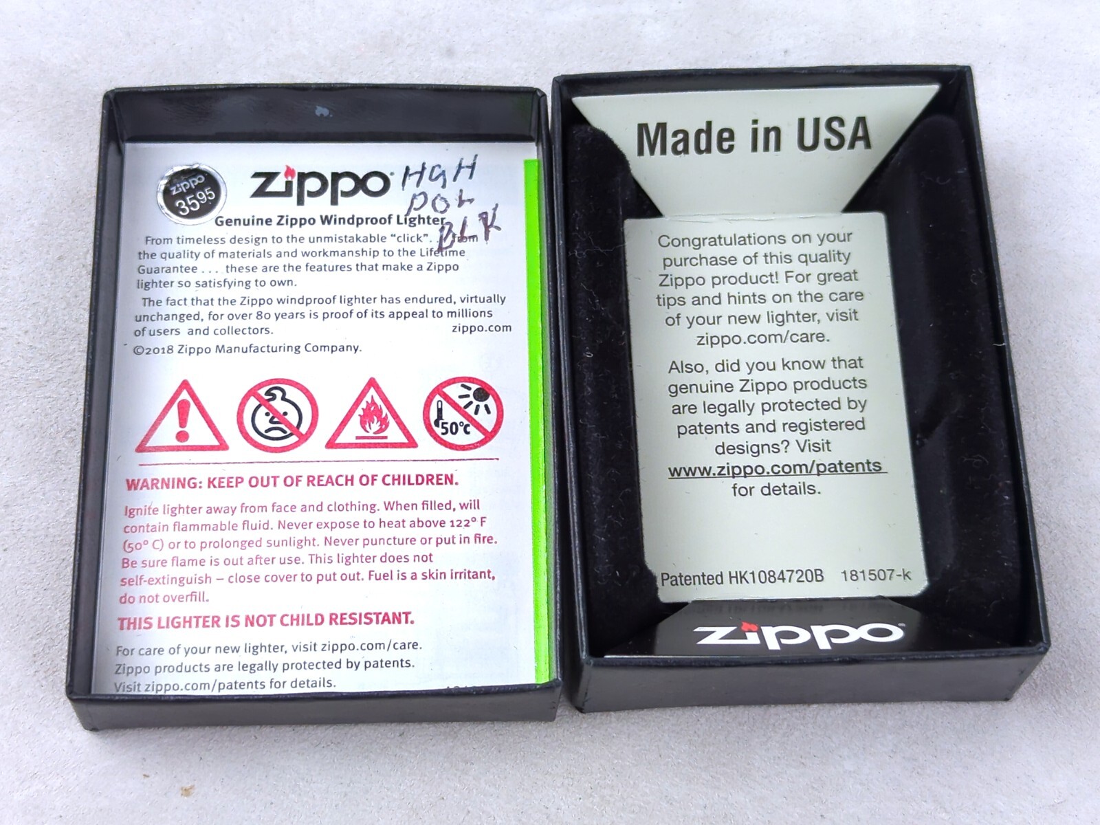 Zippo 49117 SPLIT FACE DESIGN on High Polish Black Windproof Lighter MARCH 2019