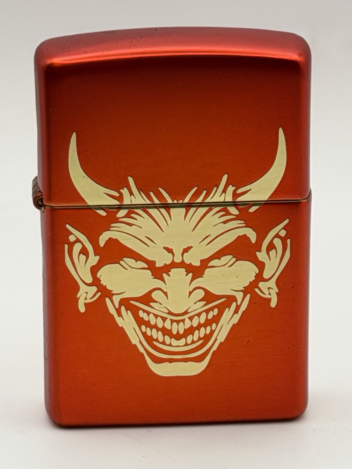 Gold Devil Design Red Metallic Zippo Lighter NEW