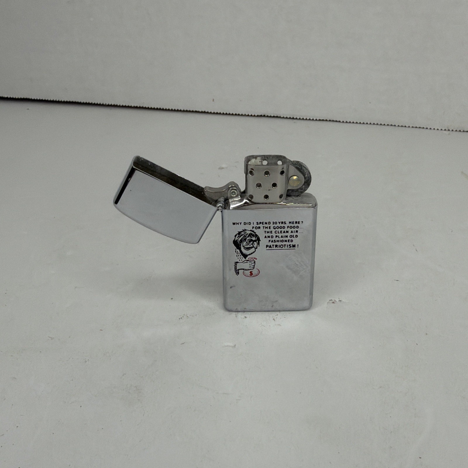 Vintage Zippo Slim Lighter Alaskan Dewline Made in USA Advertising Collectible