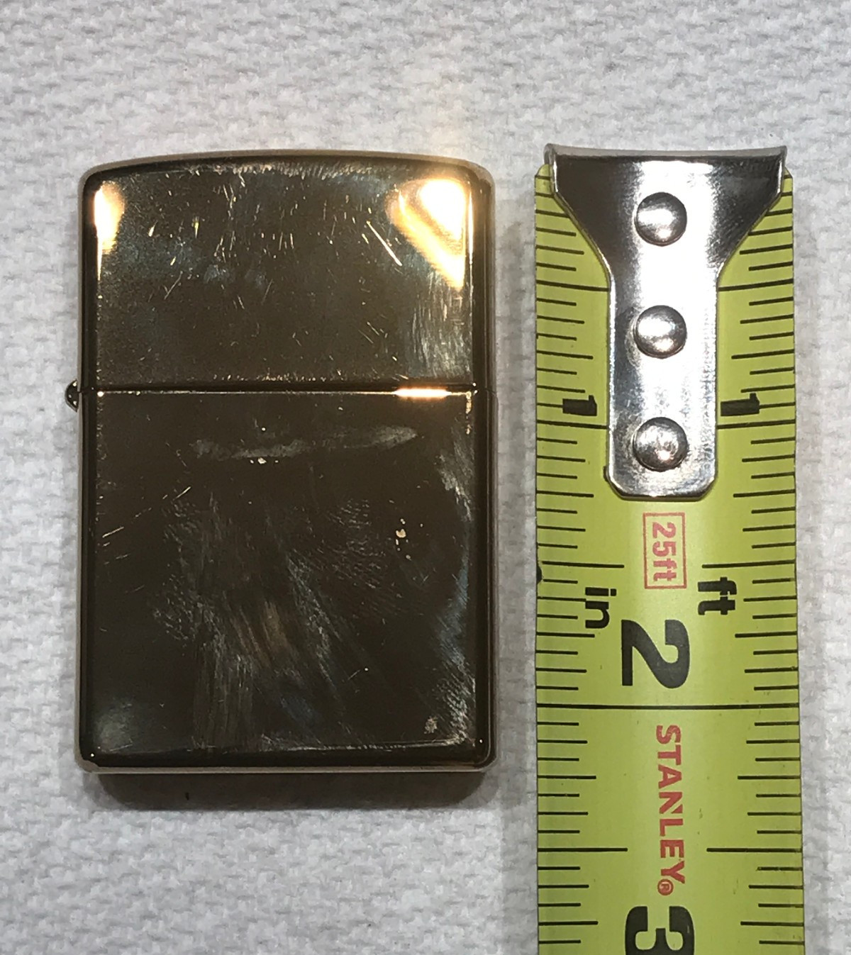 CLASSIC GOLD TONE ZIPPO LIGHTER MADE IN BRADFORD,PA. U.S.A. THE CODE IS D 05