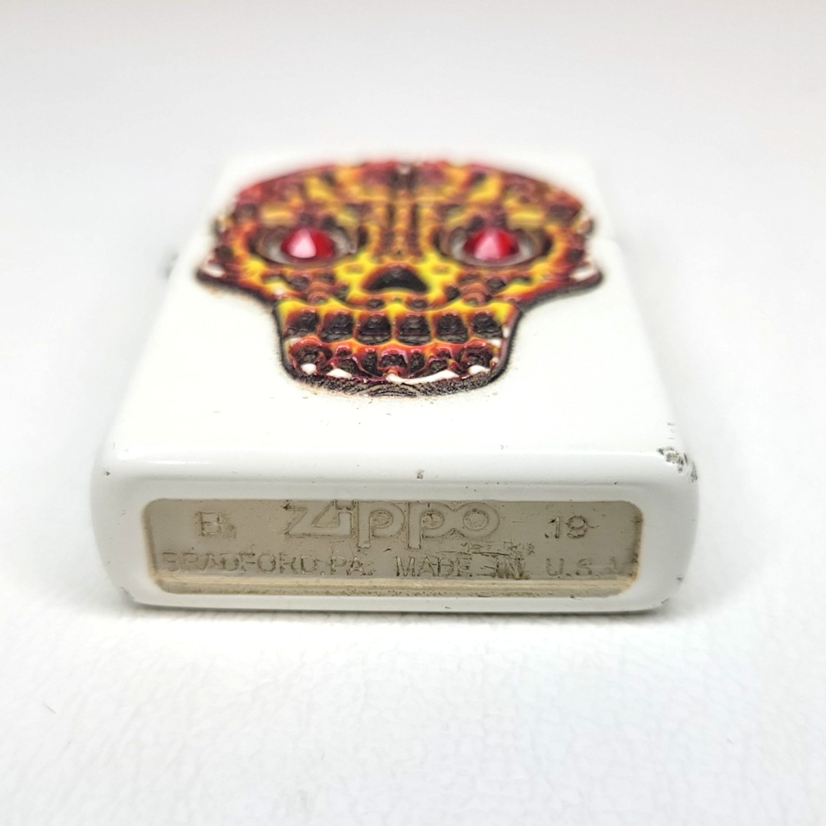 Zippo Windproof Lighter Tribal Red-Eyed Skull on White Painted Brass 2019