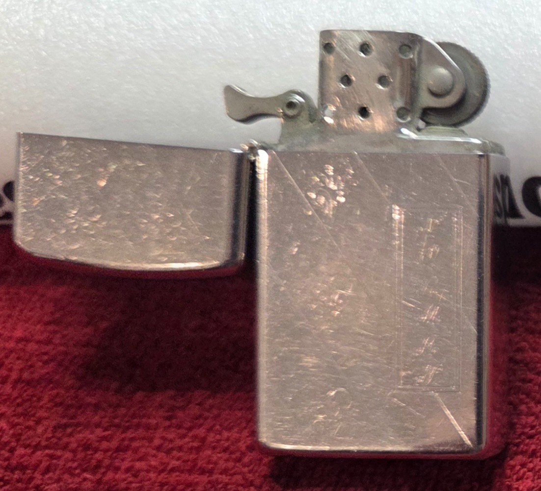 1960s or 70s Vintage Zippo Slim Lighter – Pinstripes – Norman