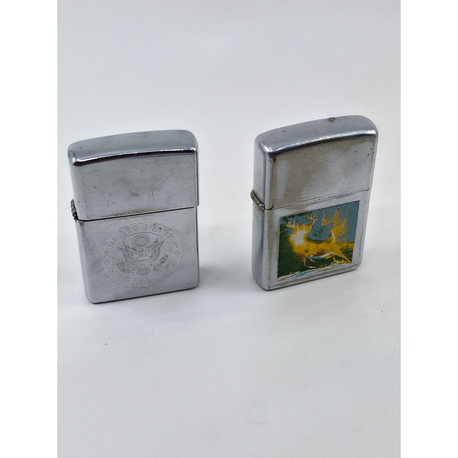 Vintage Zippo Lighter Lot 2pc USA Great Seal 1999 & Buck Deer Graphic Chrome