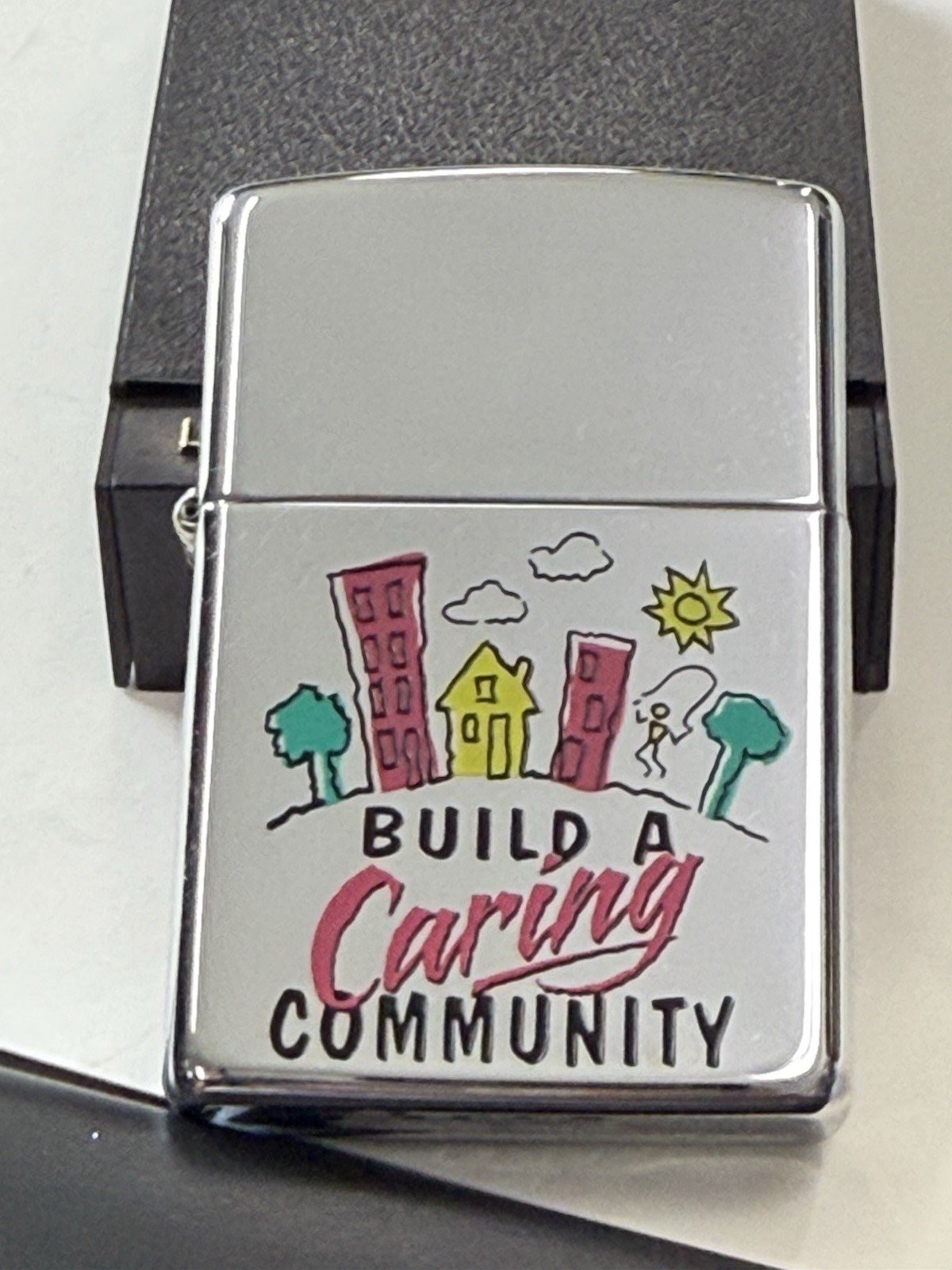 ZIPPO 1997 BUILD A CARING COMMUNITY LIGHTER SEALED IN BOX G145
