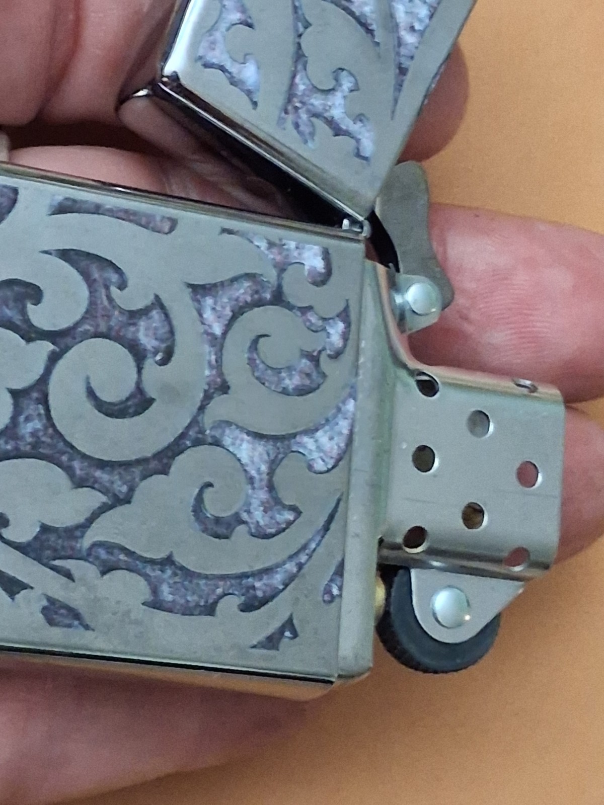 ZIPPO Lighter Struck once or twice Silver Tone Engraved Pearlized look