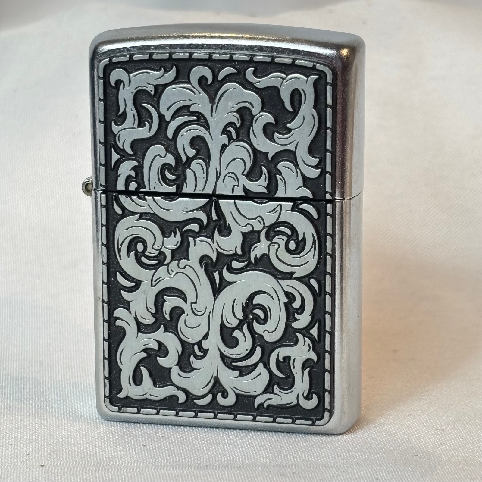 2003 Zippo Lighter Storming Scroll Sticker Sealed in Box