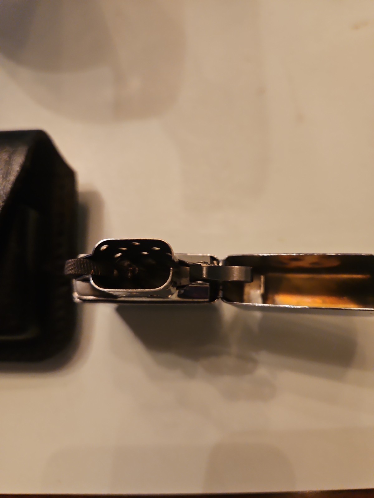 #20838. ZIPPO ,MORNING AFTER NEW IN PLASTIC CASE. RETIRED 2005 PERFECT CONDITION