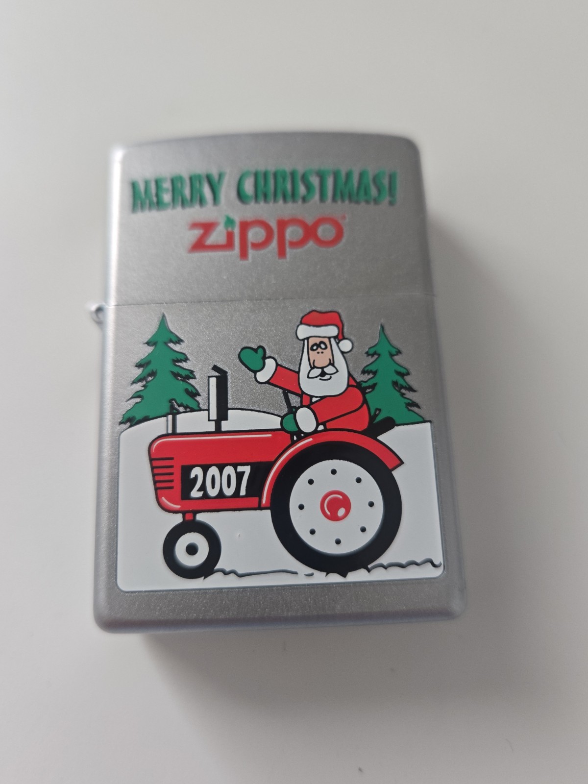 2007 ZIPPO LIGHTER CHRISTMAS ZIPPO SANTA ON A TRACTOR BRUSHED CHROME