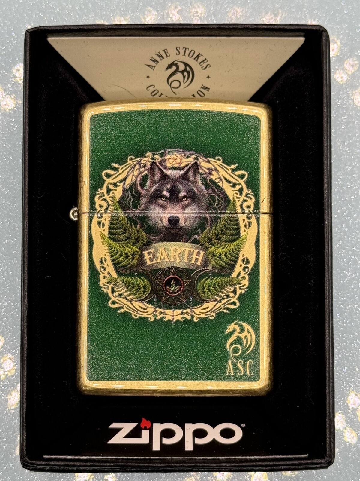2024 Anne Stokes Earth Wolf 46407 Gold Zippo Lighter NEW