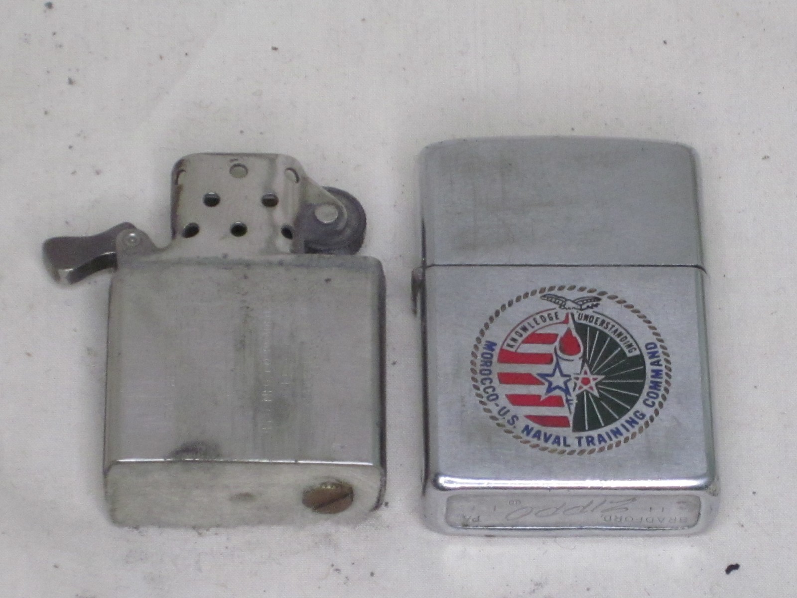 vintage ZIPPO lighter MOROCCO U.S NAVAL TRAINING COMMAND KNOWLEDGE UNDERSTANDING