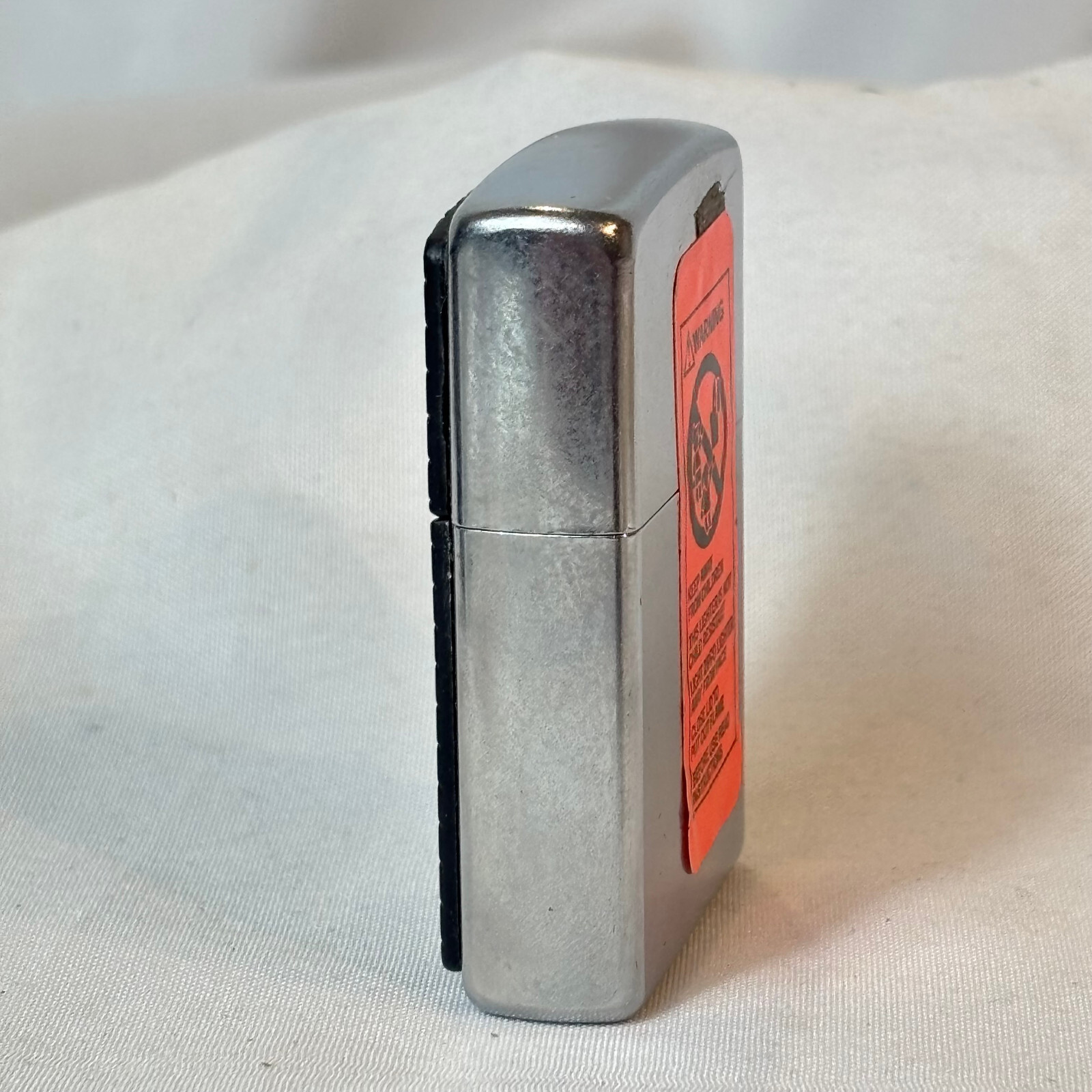 2003 Zippo Lighter Storming Scroll Sticker Sealed in Box