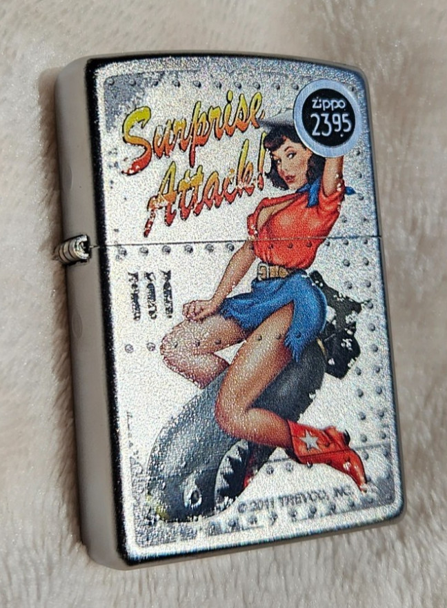 Zippo Lighter 2015 Trevco Surprise Attack Bomb Riding Pinup Cow Girl, New in Box