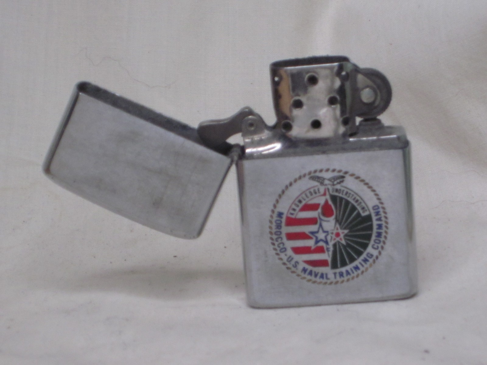vintage ZIPPO lighter MOROCCO U.S NAVAL TRAINING COMMAND KNOWLEDGE UNDERSTANDING
