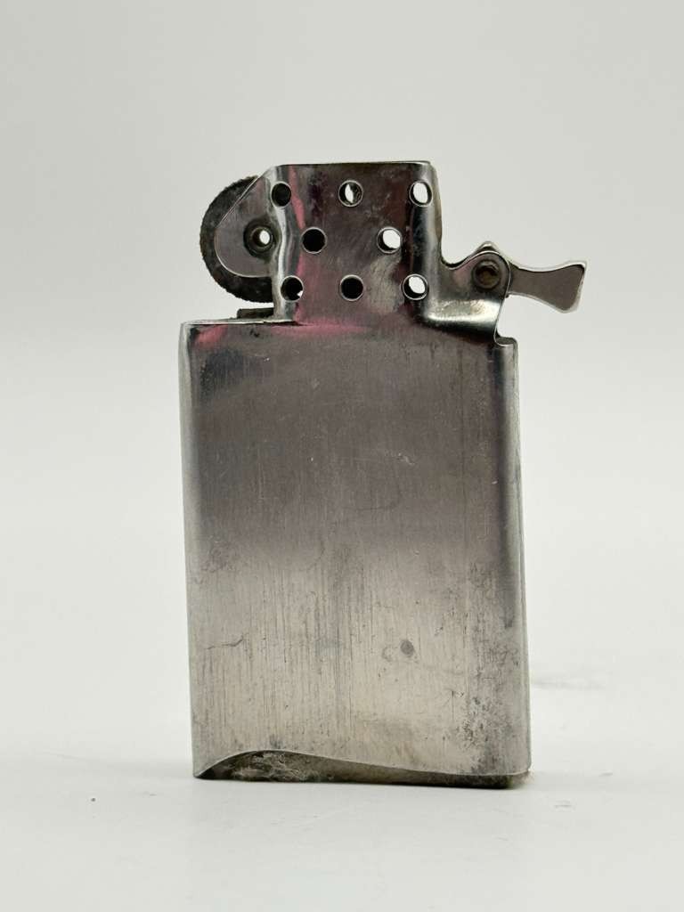 Vintage 1957 Zippo Slim Chrome Fleur De Lis Etched Pocket Lighter Pat Pending US
