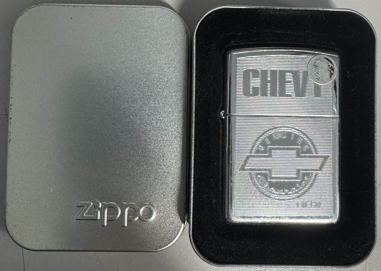 ZIPPO 2003 GENUINE CHEVROLET TM GM POLISHED CHROME LIGHTER SEALED IN BOX G305