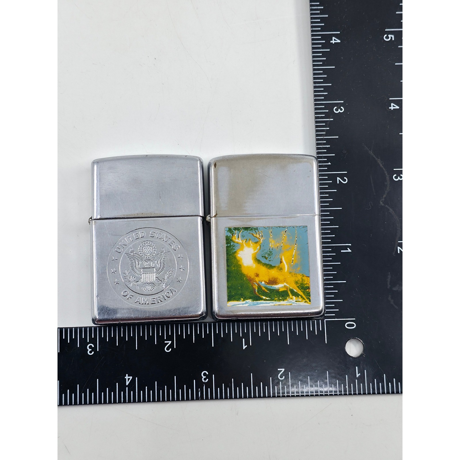 Vintage Zippo Lighter Lot 2pc USA Great Seal 1999 & Buck Deer Graphic Chrome