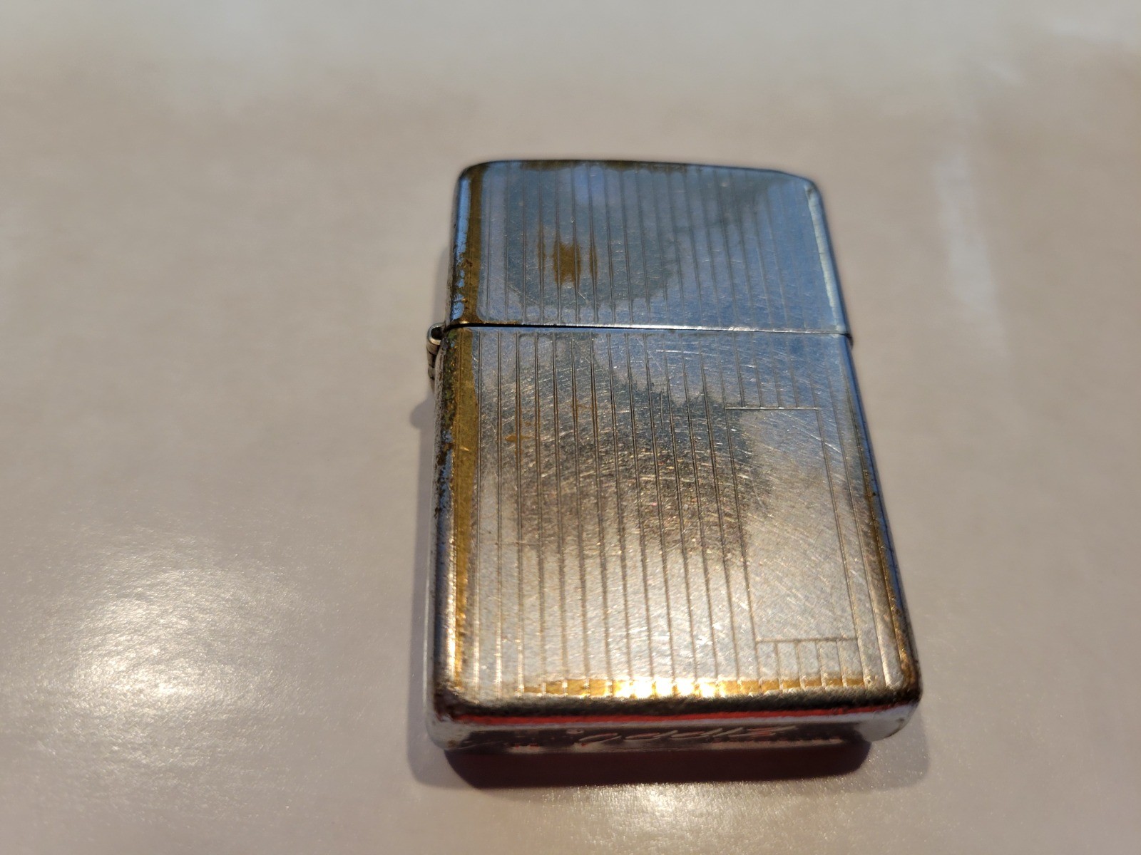 Zippo Cigarette Lighter 1969 Fancy with line has new flint working order