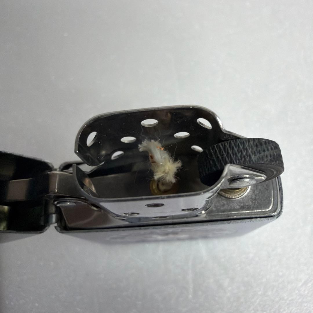 Zippo lighter featuring the destroyer escort Matsuyuki in April 1999