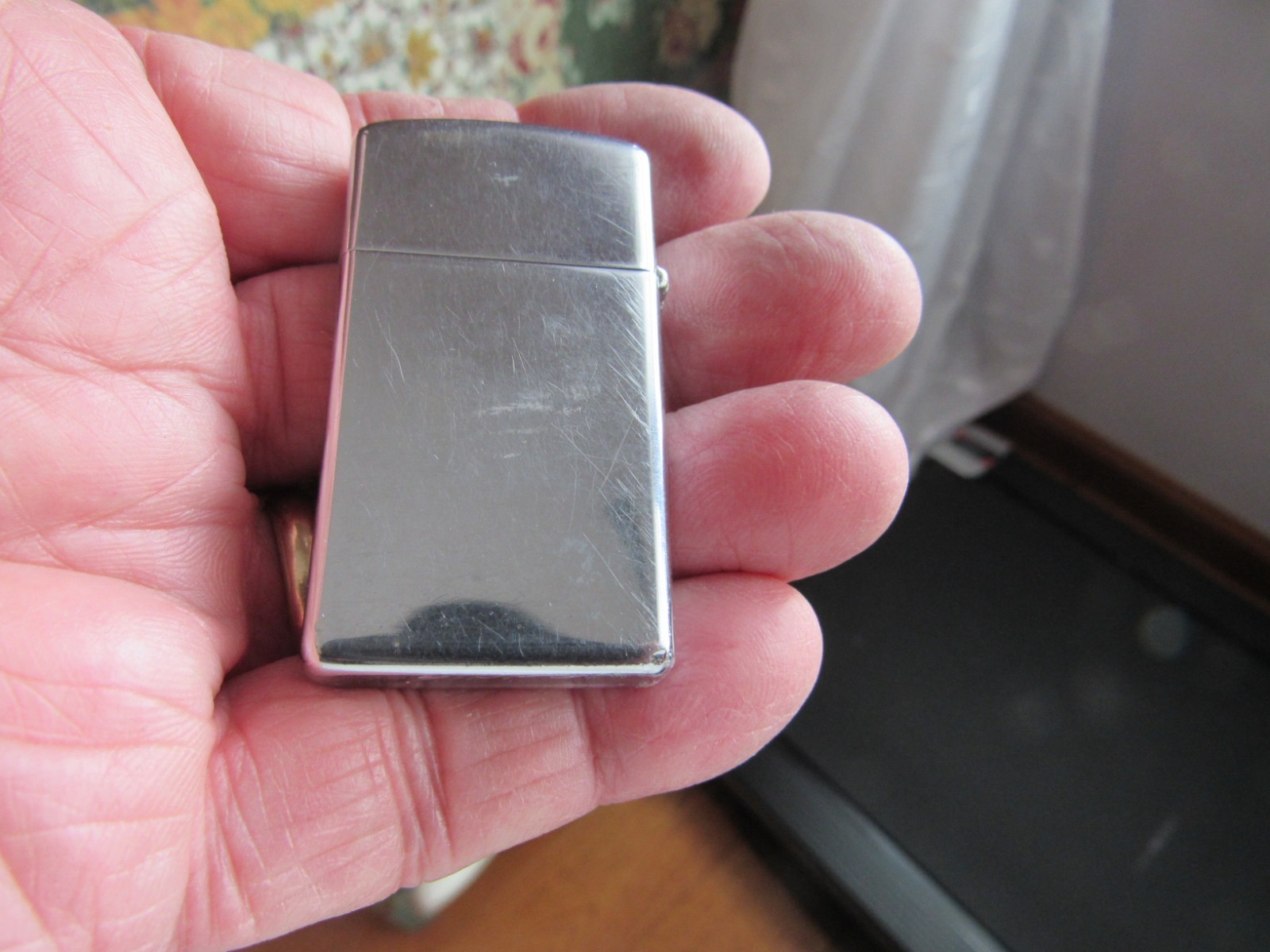 Vintage Preowned Zippo Slim Cigarette Lighter High Polish Adv. Wallace Prod.1968