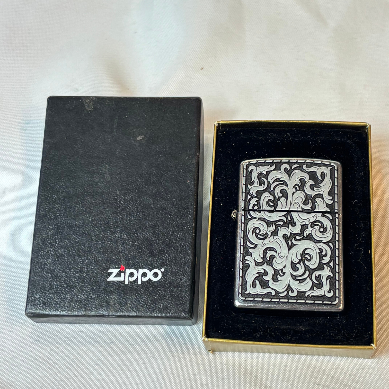 2003 Zippo Lighter Storming Scroll Sticker Sealed in Box