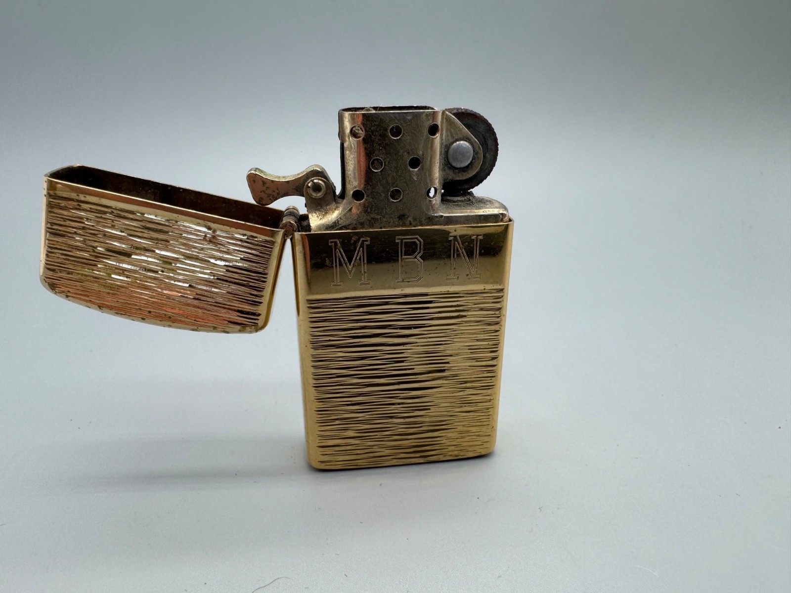 Vintage Pre-Owned Textured Gold 70’S Zippo Lighter Engraved MBN